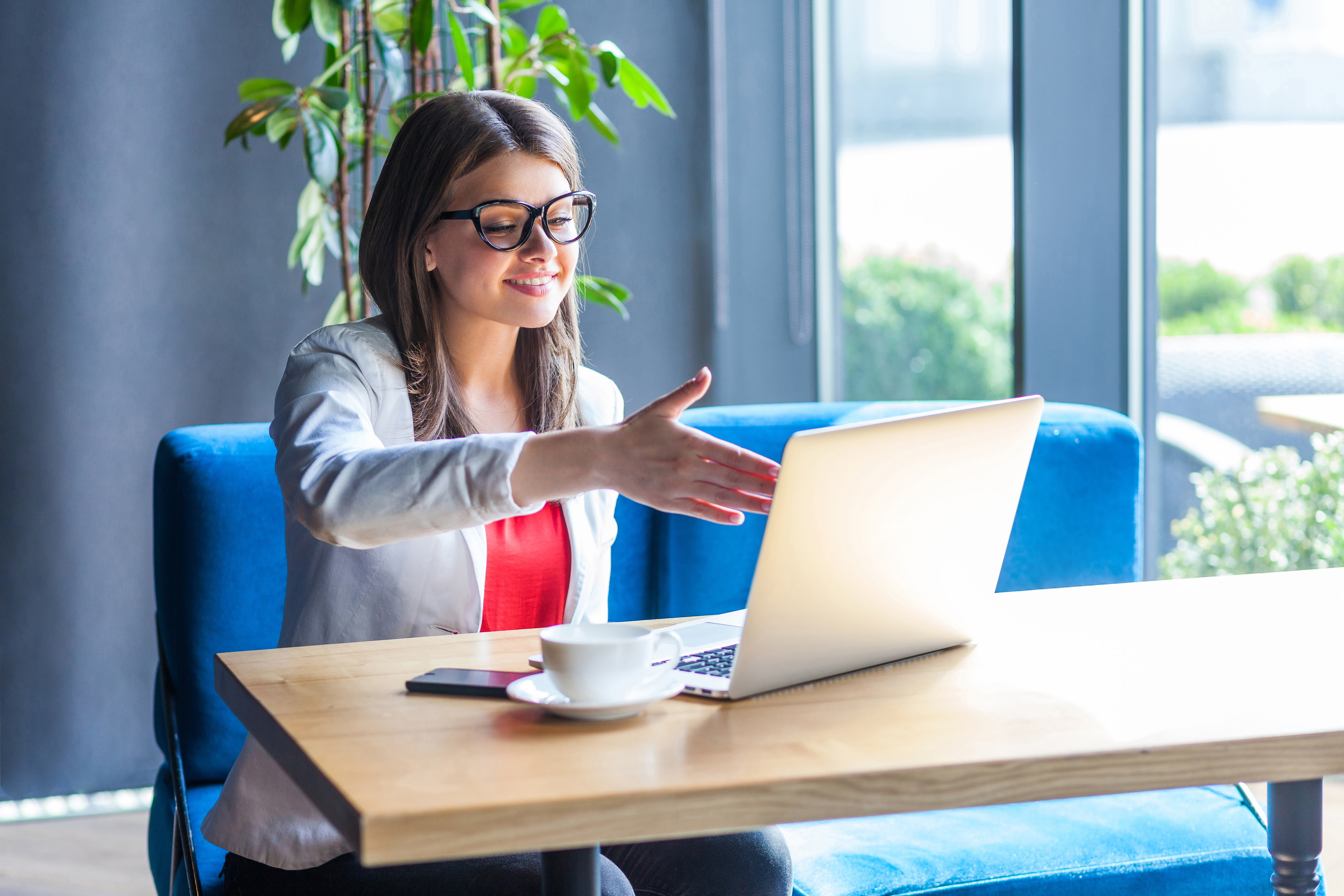 Woman conducting a video interview on her laptop